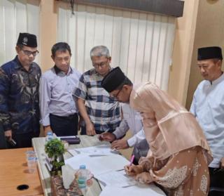 PDM Kota Pekanbaru Jalin Kerja Sama dengan PT. SAI untuk Penyelenggaraan Umrah dan Haji Plus